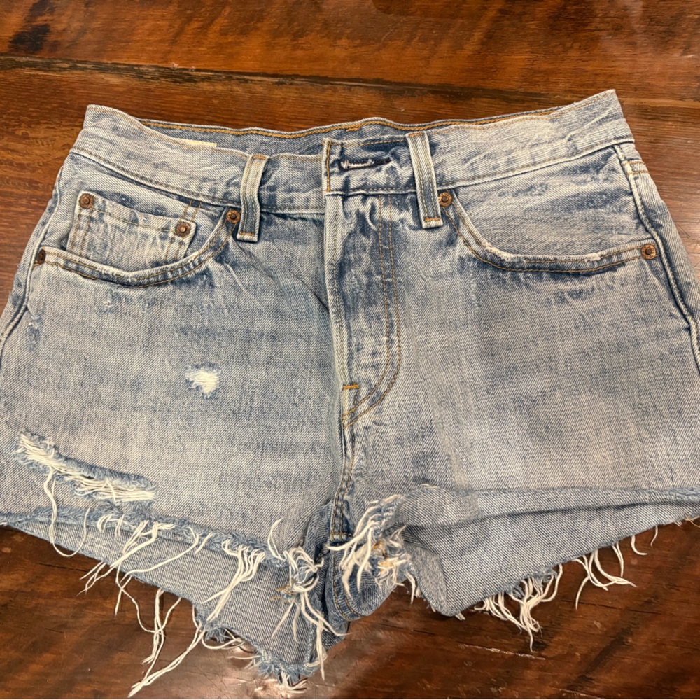 Vintage Levi's Light Blue Distressed Denim low rise Jean Shorts